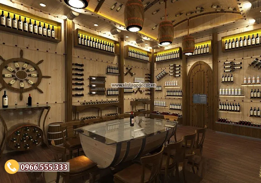 Phối cảnh phòng rượu tường gỗ sáng, các cụm kệ ngắn gắn tường xếp chai đứng, bánh lái tàu và bàn kính giữa phòng