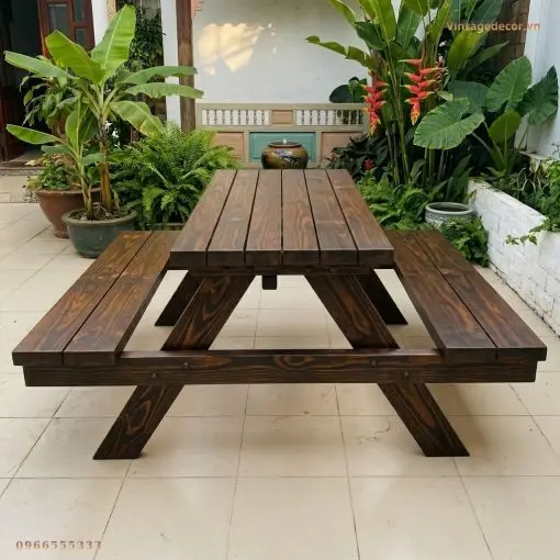 Bàn Ghế Gỗ Chữ A BG1 - Kiểu Picnic Truyền Thống, Gỗ Thông Bàn ghế gỗ chữ A BG1 picnic trên sân lát gạch cạnh chậu cây lá to